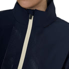 Equestro Women's Foldable Softshell Jacket - Navy Blazer; close up of zipper & collar, worn by model on white background | Malvern Saddlery