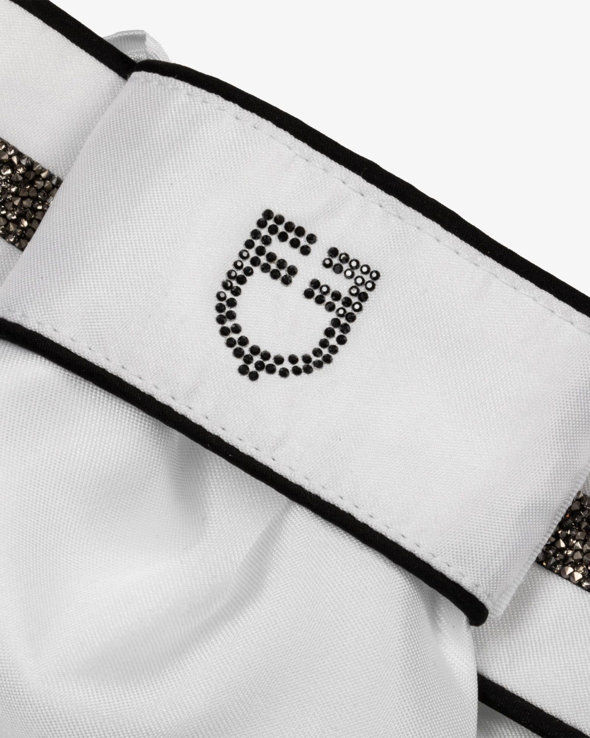Equestro Impero Crystal Stock Tie - White/Black; close up of crystal logo | Malvern Saddlery
