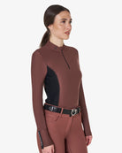 Equestro Women's Long-Sleeved Technical Polo Shirt - Maroon; on woman on white background | Equestrian Training Shirts | Malvern Saddlery