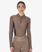 Equestro Women's Long-Sleeved Technical Polo Shirt - Walnut; on woman on white background | Equestrian Training Shirts | Malvern Saddlery
