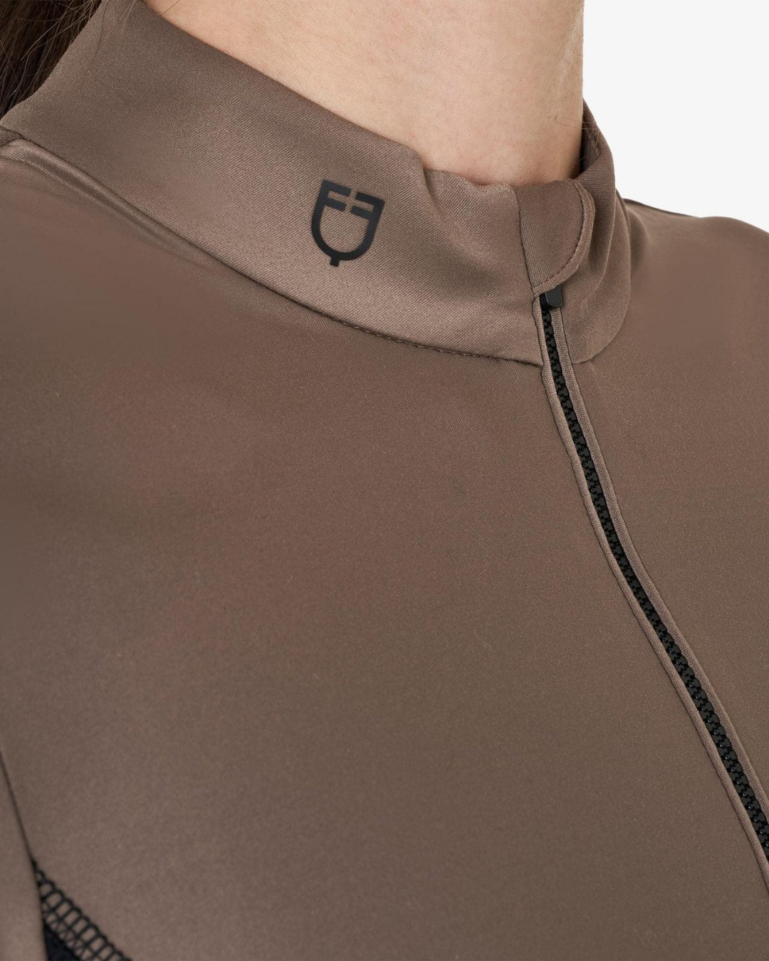 Equestro Women's Long-Sleeved Technical Polo Shirt - Walnut; close up of collar on woman | Equestrian Training Shirts | Malvern Saddlery