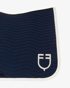 Equestro Wave Dressage Saddle Pad - Navy/Antique White; back logo detail | Malvern Saddlery