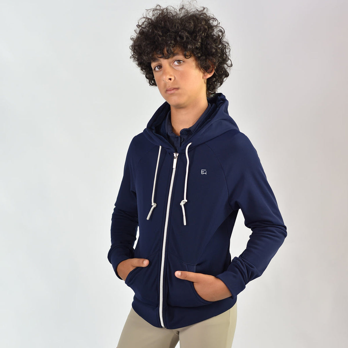 For Horses Mic Kids Zip Hoodie in Navy worn with hands in front pockets
