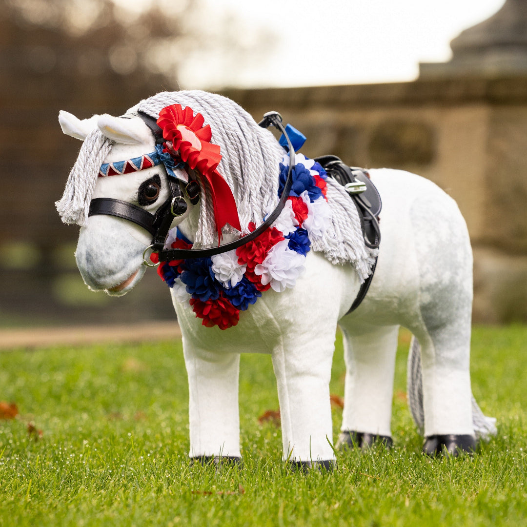 LeMieux Hobby Horse Flower Sash - Multicolor-red, white, blue, shown on white toy pony | Toys | Malvern Saddlery