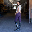 Halter Ego Women's Evolution Mid Waist Full Grip Breeches - Dark Plum, side and back view on model with crystal pockets | Malvern Saddlery