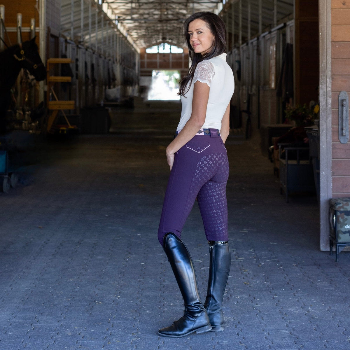 Halter Ego Women's Evolution Mid Waist Full Grip Breeches - Dark Plum, side and back view on model with crystal pockets | Malvern Saddlery