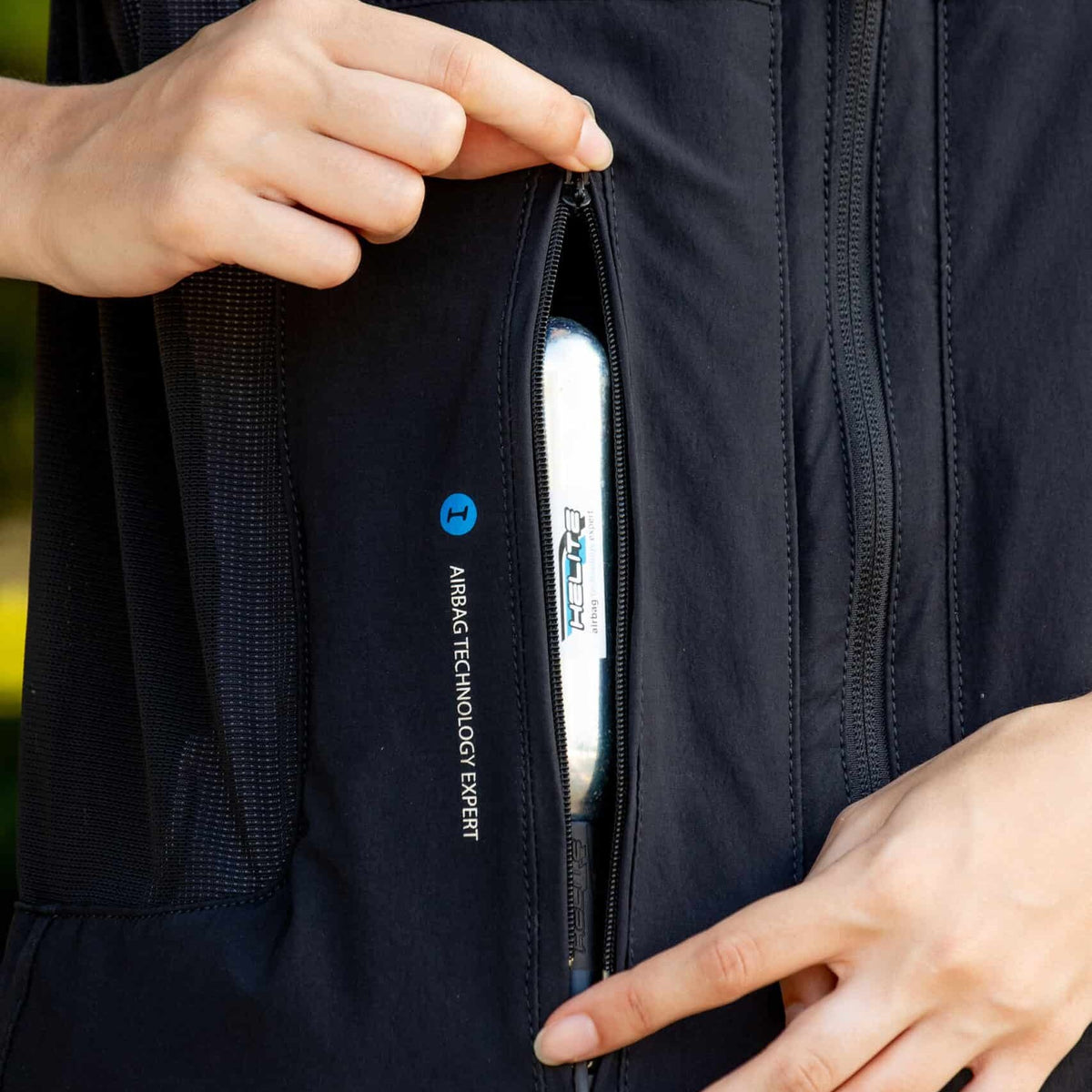 Helite Zip'In 2 Airbag Vest - Black, CO2 cartridge pocket close-up | Malvern Saddlery