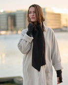 Woman wearing Luxe Fleece Wrist Warmers, Triangle Scarf & Cardigan  Malvern Saddlery