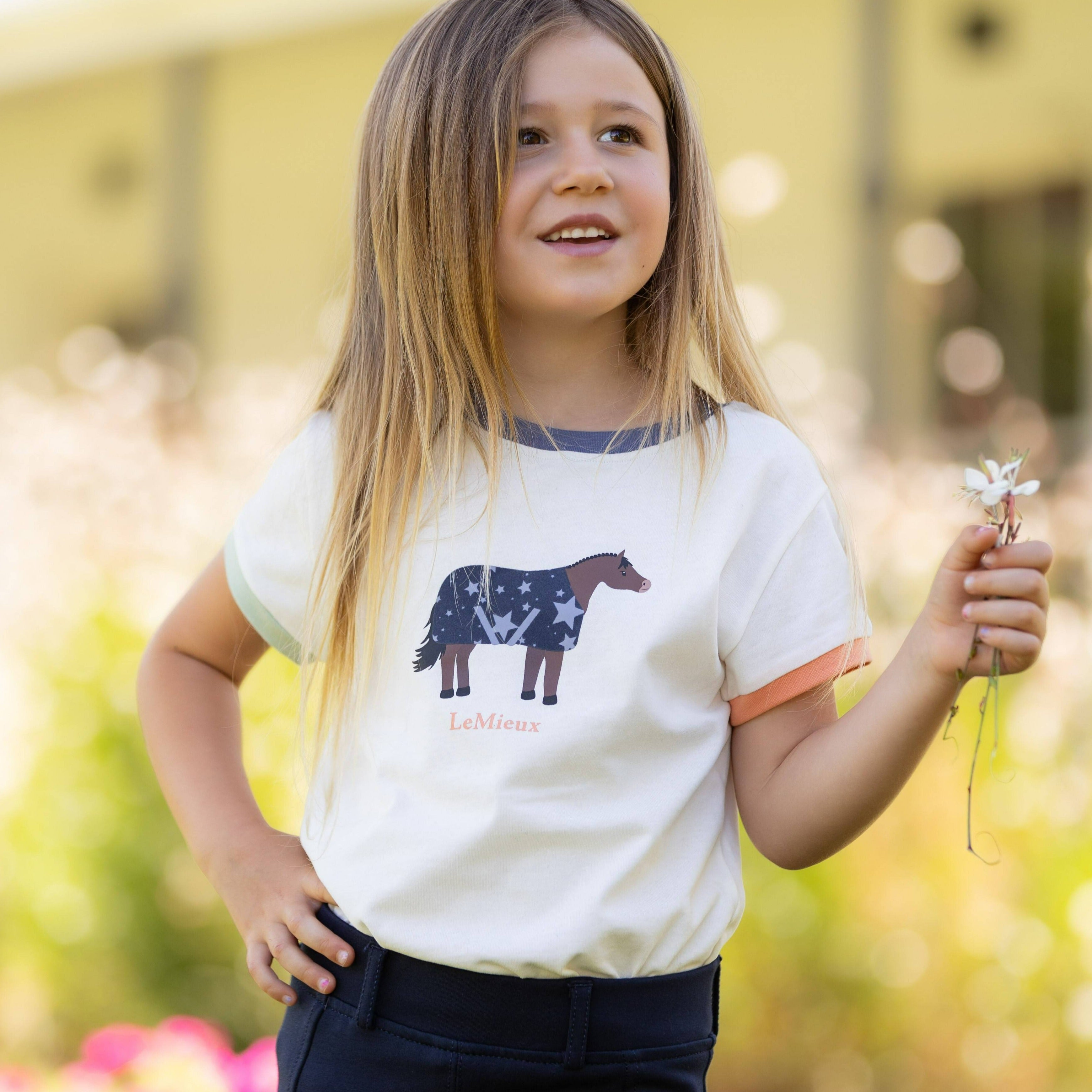 LeMieux Mini Alex Tee - Ecru, lifestyle image | Malvern Saddlery