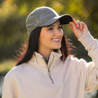 LeMieux Simone Baseball Cap Thyme, shown on model | Malvern Saddlery