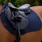 LeMieux  Eurojump Square Saddle Pad - Navy, shown on horse with saddle | Malvern Saddlery