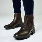 LeMieux Junior Zip Paddock Boots in Brown on model showing side zip and sole details