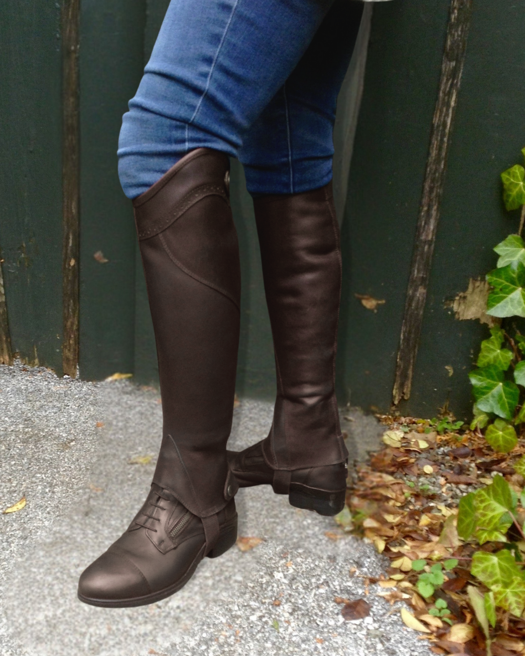 Kavalkade Leather Romulus  Side Zip Paddock Boot  & Remus Half Chap - Brown, shown on person standing in front of green wall | Riding Boots  | Malvern Saddlery