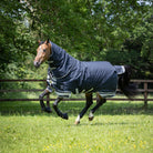 LeMieux Arika Storm-Tek 200g Turnout Rug - Navy; shown on horse running in field | Horse Blankets | Malvern Saddlery