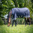 LeMieux Arika Storm-Tek 200g Turnout Rug - Navy; shown without neck attachment on horse in field | Horse Blankets | Malvern Saddlery
