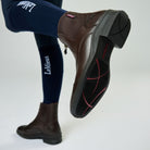 LeMieux Junior Zip Paddock Boots -Brown - on model showing side & sole | Malvern Saddlery