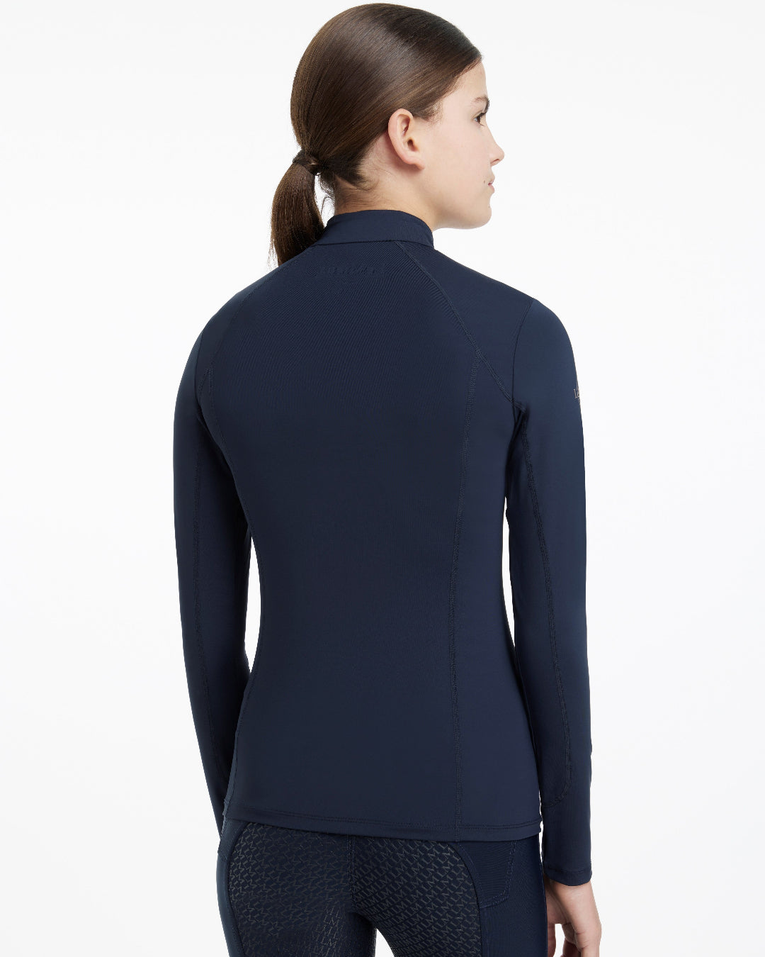 LeMieux Young Rider Classique Base Layer - Navy; back view on model, white background | Children's Training Shirts | Malvern Saddlery