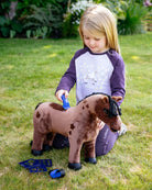 LeMieux Toy Pony - "Gracie",Child playing with a plush horse toy outdoors on grass | Malvern Saddlery
