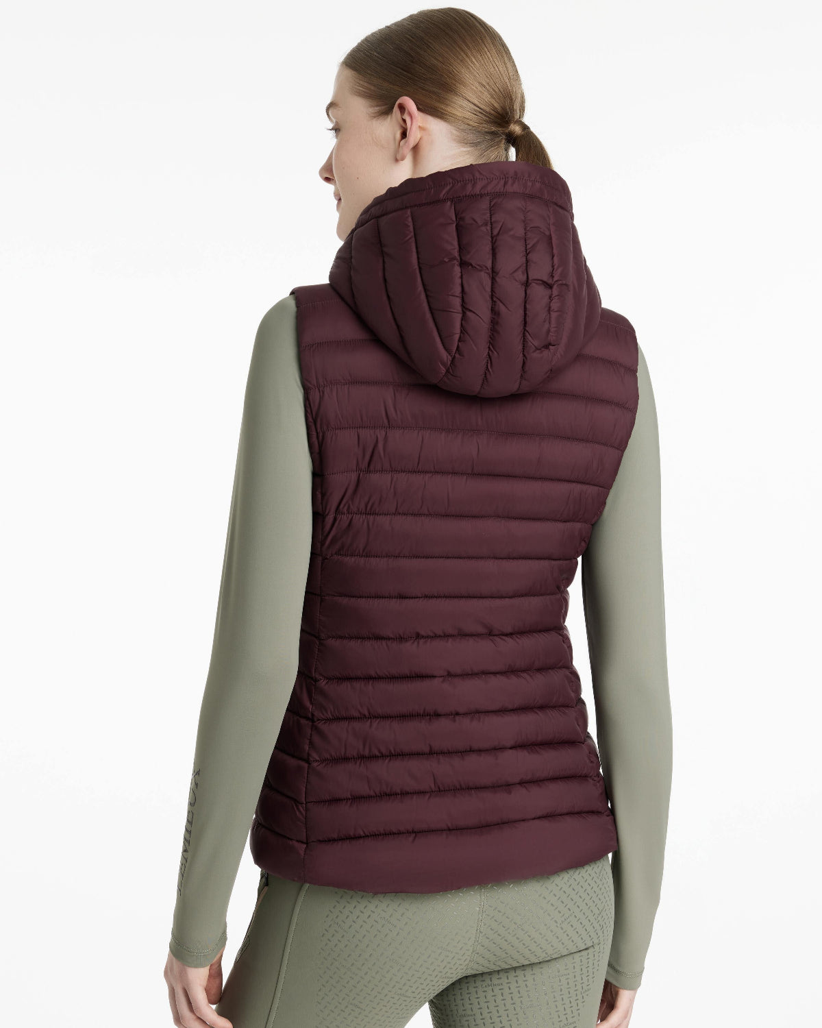 LeMieux Rose Hooded Puffer Vest - Damson Maroon, back viewshown on woman on white background| Malvern Saddlery