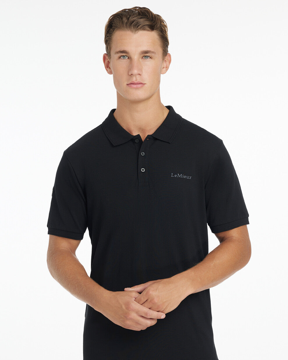 LeMieux Men's Classique Polo Shirt - Black - shown on man on white background | Men's Athletic Wear | Malvern Saddlery
