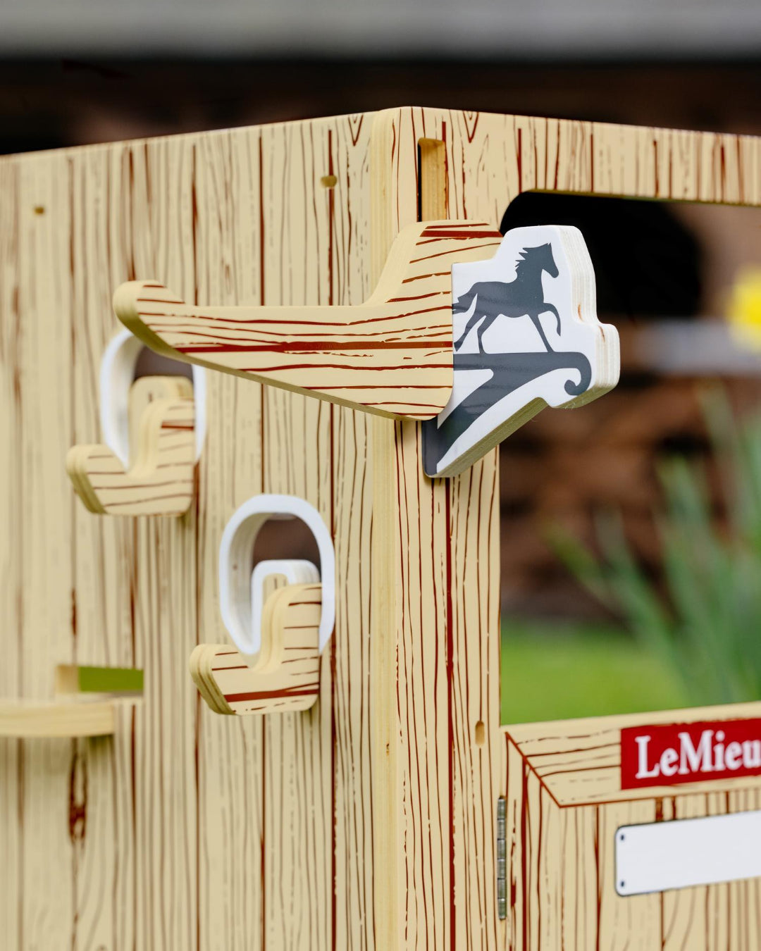 LeMieux Toy Pony Wooden Stable Set - detail of hooks shown outdoors | Malvern Saddlery