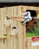 LeMieux Toy Pony Wooden Stable Set - detail of hooks shown outdoors | Malvern Saddlery
