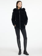 LeMieux Aspen Puffer Jacket - Black; shown on model wearing riding pants & boots | Ladies' Outerwear | Malvern Saddlery