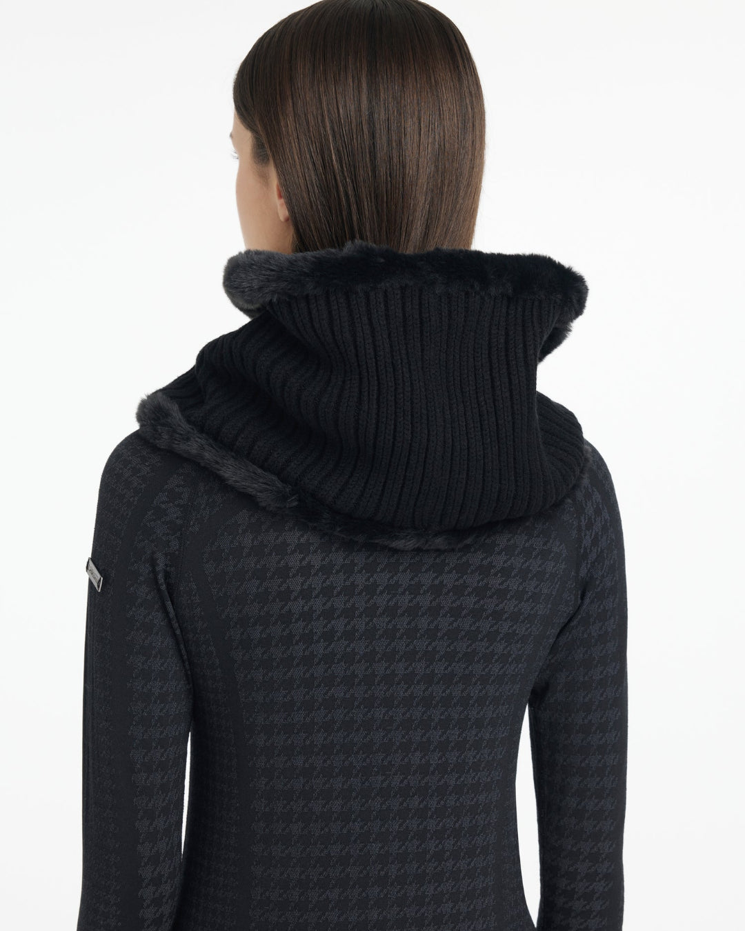 LeMieux Aspen Snood - Black; back view shown on woman against white background | Hats, Gloves & Scarves | Malvern Saddlery