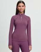 LeMieux Young Rider Airflow Base Layer - Mallow Pink; shown on model | Malvern Saddlery
