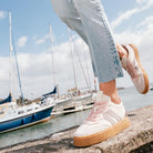 LeMieux Stockbridge Suede Lifestyle Trainers - Stone; shown on woman walking by marina | Casual Footwear | Malvern Saddlery