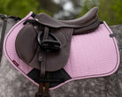 LeMieux Essence Close Contact Square Saddle Pad - Fondant Pink; on dappled gray horse with brown saddle outdoor background | Tack Shop | Malvern Saddlery