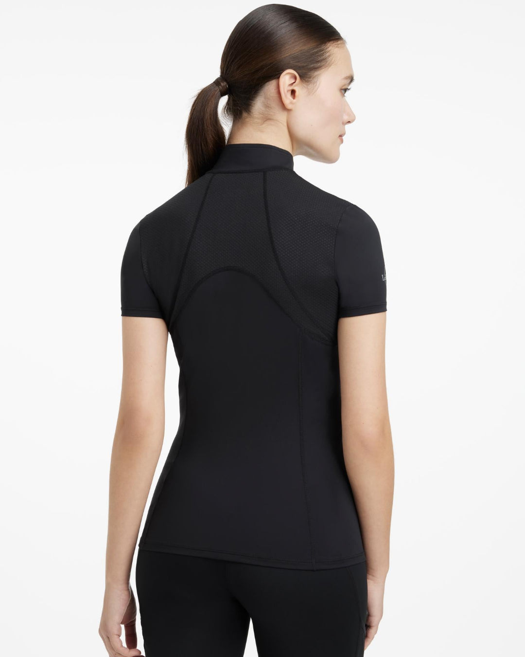 LeMieux Mia Mesh Women's Short Sleeve Base Layer - Black; back view shown on woman | Malvern Saddlery