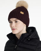 LeMieux Clara Rib Beanie - Damson Dark Red - shown on woman against white background | Winter Hats | Malvern Saddlery