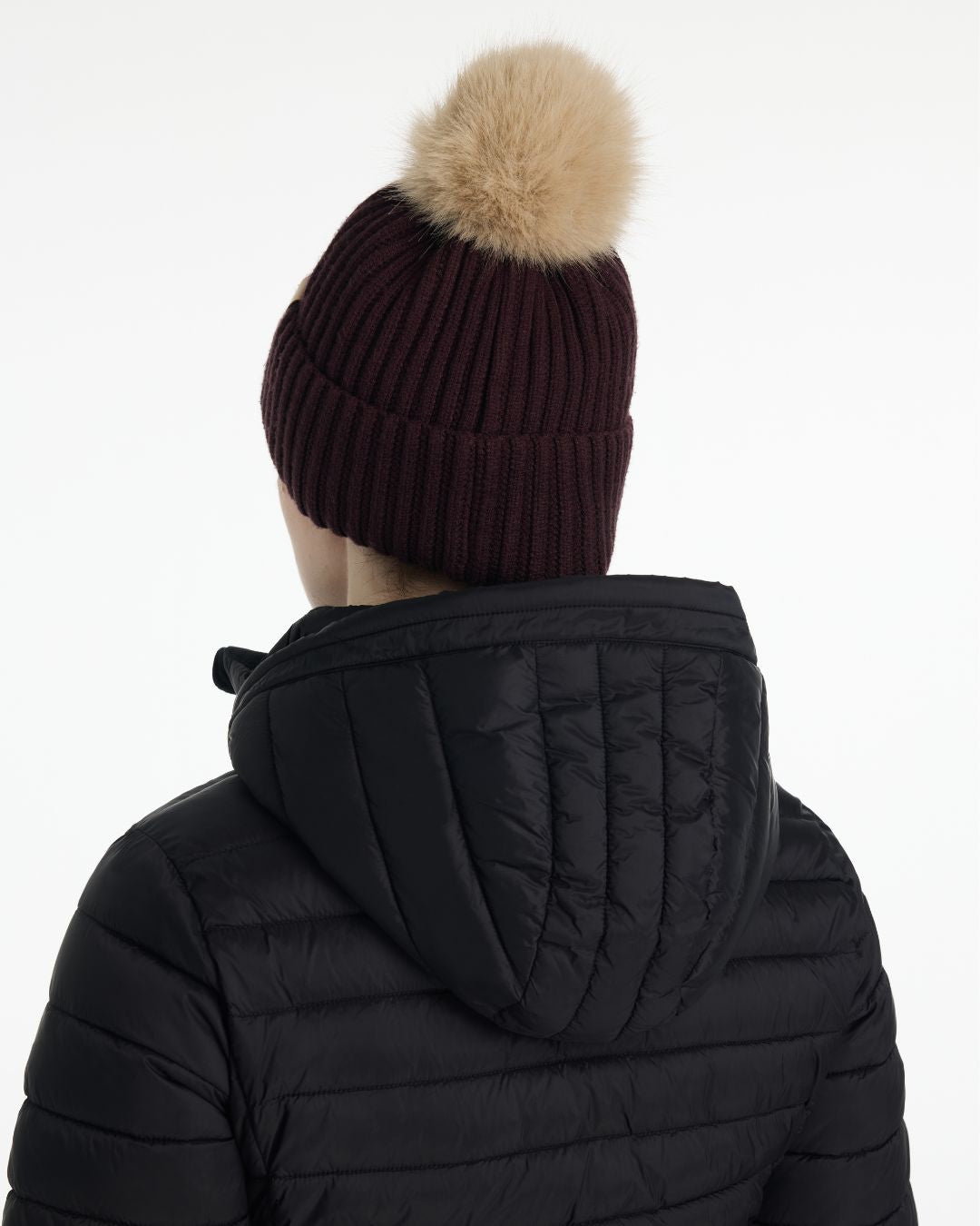 LeMieux Clara Rib Beanie - Damson Dark Red - back view shown on woman | Winter Hats | Malvern Saddlery