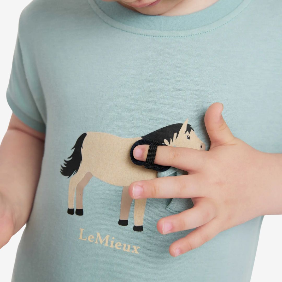 LeMieux Mini Alex Tee - Aqua, detail with finger brush | Children's Apparel | Malvern Saddlery