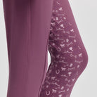 LeMieux Mini Pull On Breech - Mallow Pink; inside leg detail of grip pattern on model, gray background | Malvern Saddlery