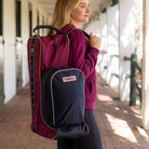 LeMieux Boot & Hat Bag - Blackberry, carried on the shoulder | Malvern Saddlery