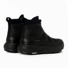 Rear view of black LeMieux Cavara Performance High Top Trainers showing heel counters, Michelin outsoles, and waterproof build.