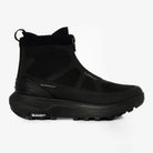 Side view of black LeMieux Cavara Performance High Top Trainer, waterproof equestrian barn boot with Michelin sole and front zipper.