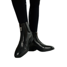 LeMieux Women’s Zip Paddock Boots in Black shown on model with black riding tights and front zip detail