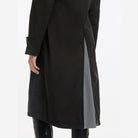 LeMieux Women's Amelie Waterproof Riding Coat - Black, back zip and reflective panel | Malvern Saddlery