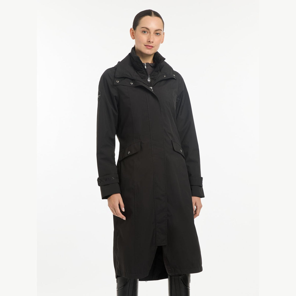 LeMieux Women's Amelie Waterproof Riding Coat - Black, worn, front view | Malvern Saddlery