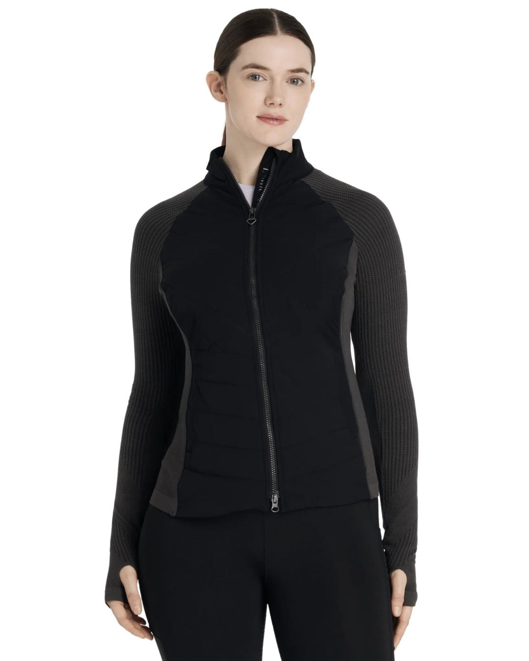 LeMieux Maddie Hybrid Jacket - Black, shown on woman against white background | Ladies Outerwear | Malvern Saddlery
