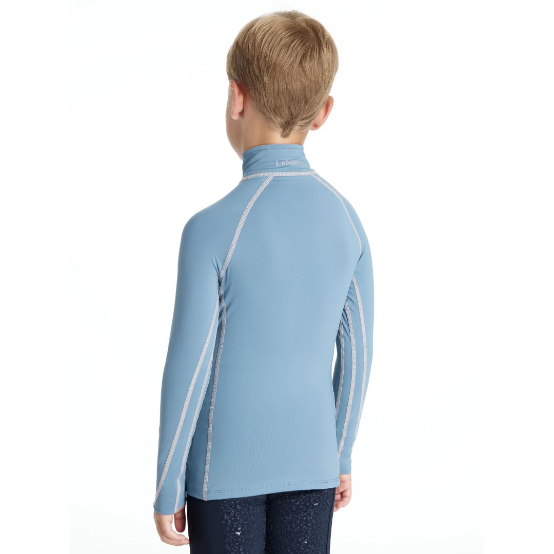 LeMieux Mini Classique Base Layer - Ice Blue; back view shown on boy against white background | Malvern Saddlery