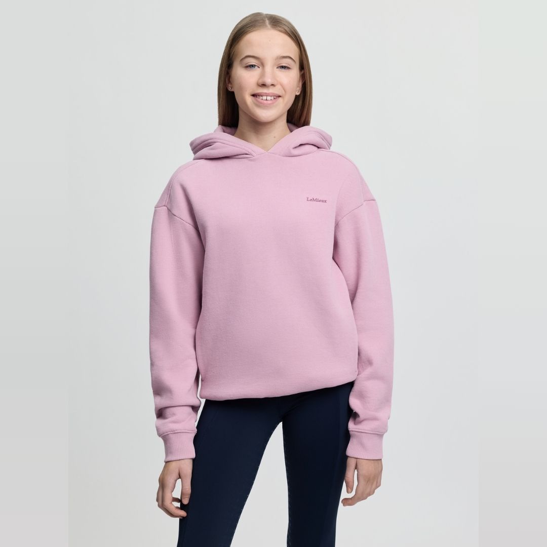 LeMieux Young Rider Sia Hoodie - Fondant PInk; shown on person | Malvern Saddlery