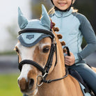 LeMieux Mini Ear Bonnet - Glacier, shown on palomino pony | Malvern Saddlery