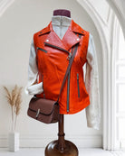 Italian Leather Moto Jacket , shown with crossbody bag- Orange | Fashion Collection | Malvern Saddlery