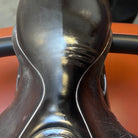 Close-up of a black leather saddle conditioned with Ovis & Castor Leather Balm | Tack Care | Boot Care | Malvern Saddlery