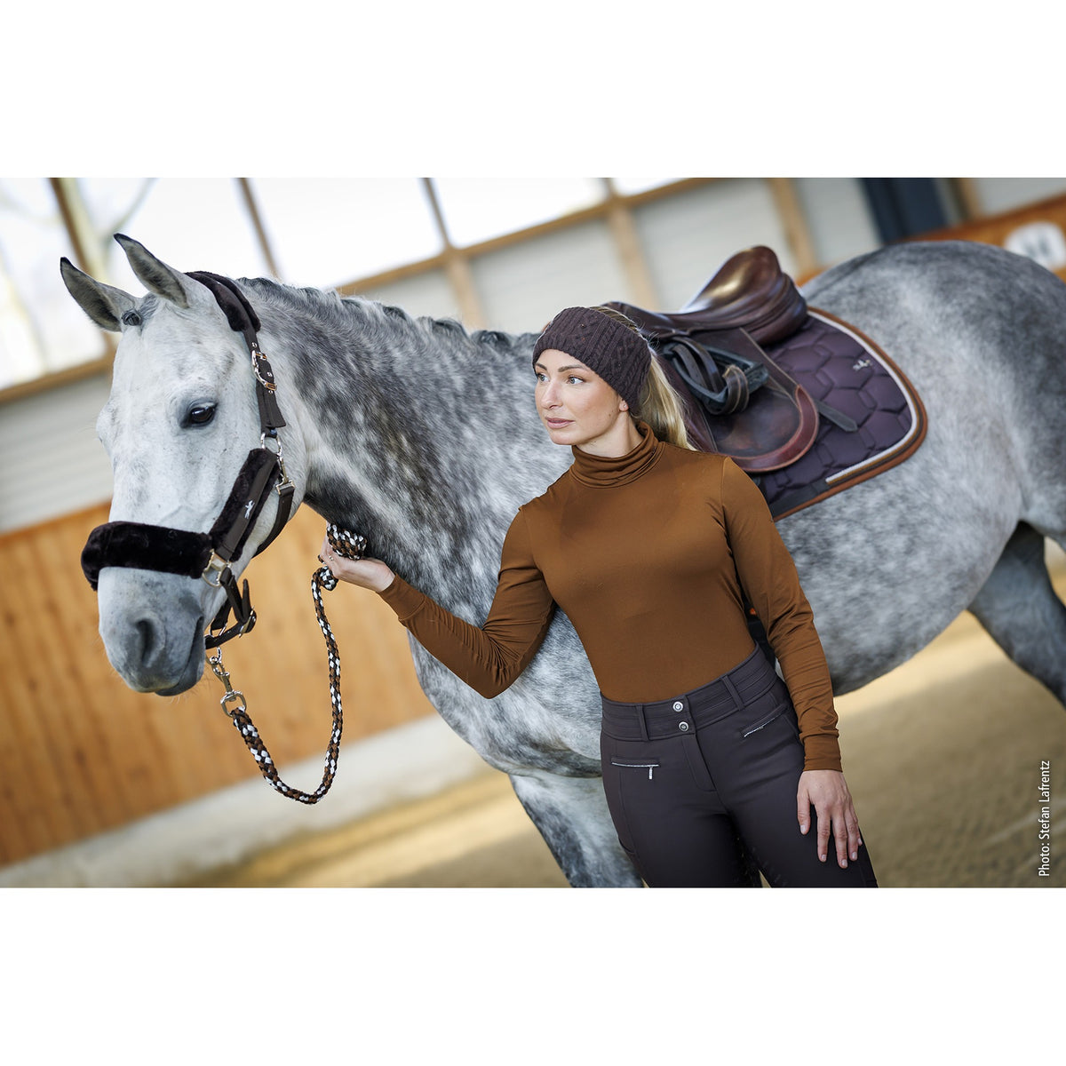 Schockemöhle Alba Style Women's Turtleneck Training Top in Nougat worn with a horse