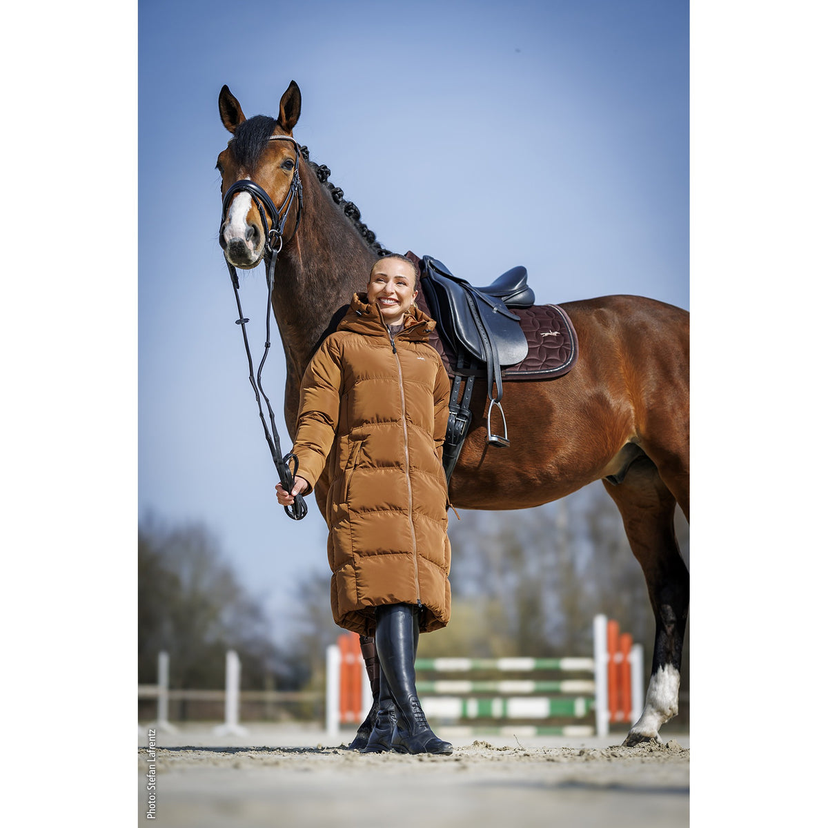Schockemöhle Kacy Style Women's Long Quilted Coat in Nougat worn with a horse